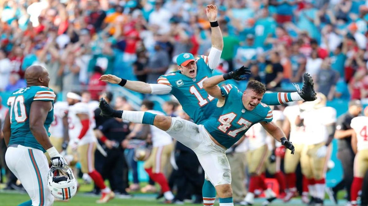Miami Dolphins middle linebacker Kiko Alonso (47) and quarterback Ryan Tannehill (17) celebrate after San Francisco 49ers quarterback Colin Kaepernick (7) is stopped from scoring in the final seconds of the game at Hard Rock Stadium in Miami Gardens on Sunday, November 27, 2016.