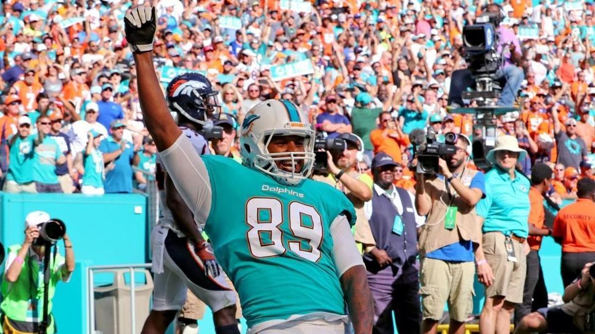 Miami Dolphins Julius Thomas (89) celebrates after a second quarter touchdown as they play the Denver Broncos at Hard Rock Stadium in Miami Gardens, Florida, Dec. 3, 2017.