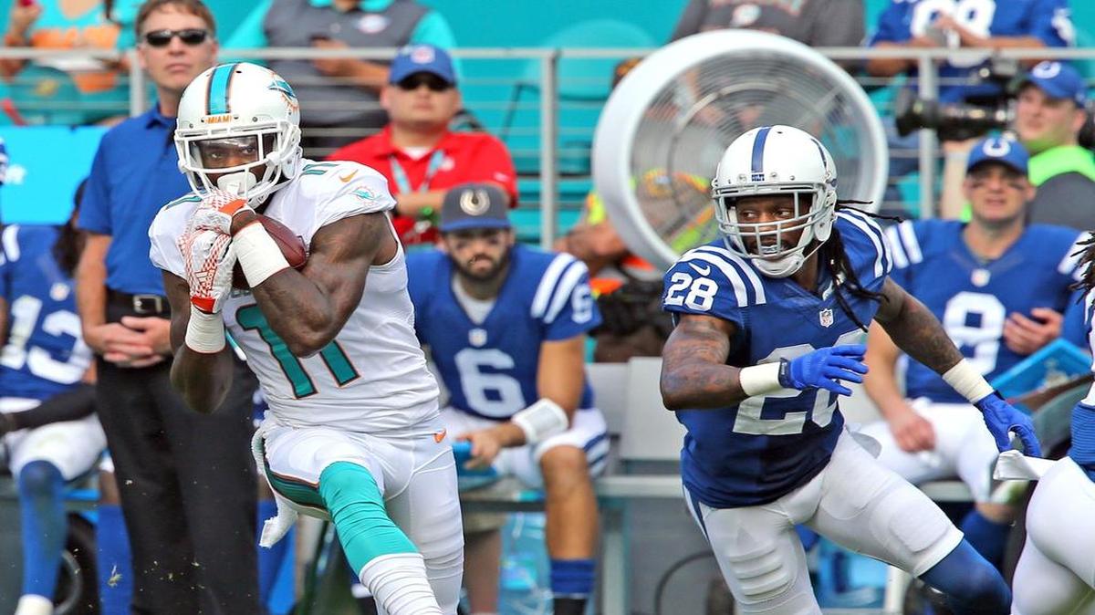 Miami Dolphins DeVante Parker catches a long pass from quarterback Ryan Tannelhill in the first quarter as they play the Indianapolis Colts at Sun Life Stadium in Miami Gardens, Florida, December 27, 2015.