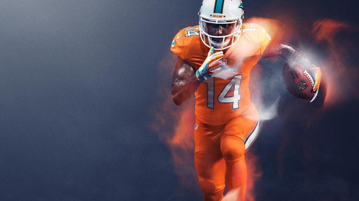Dolphins receiver Jarvis Landry shows off Nike’s all-orange look for Miami’s Thursday night game on Sept. 29.