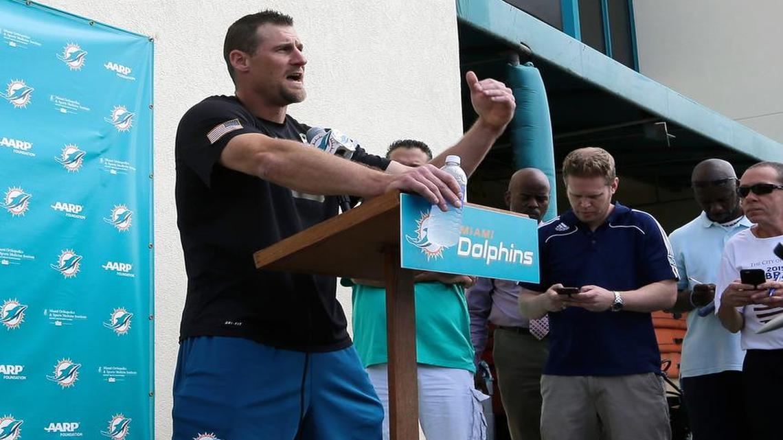Miami Dolphins interim coach Dan Campbell talks to reporters after practice Wednesday in Davie.
