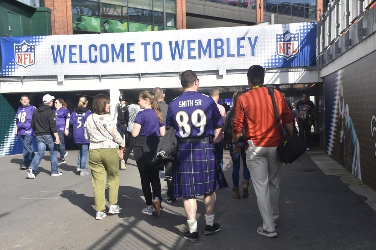 Fans enter the Wembley Stadium complex for the Baltimore Ravens-Jacksonville Jaguars game in London on Sept. 24, 2017.