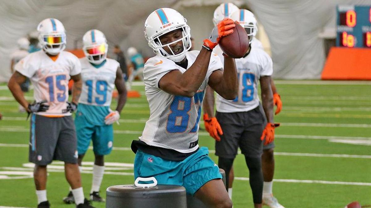 Miami Dolphins receiver Rashawn Scott (87), seen here during a June practice, had two catches for 65 yards in Saturday’s Dolphins scrimmage at Hard Rock Stadium.
