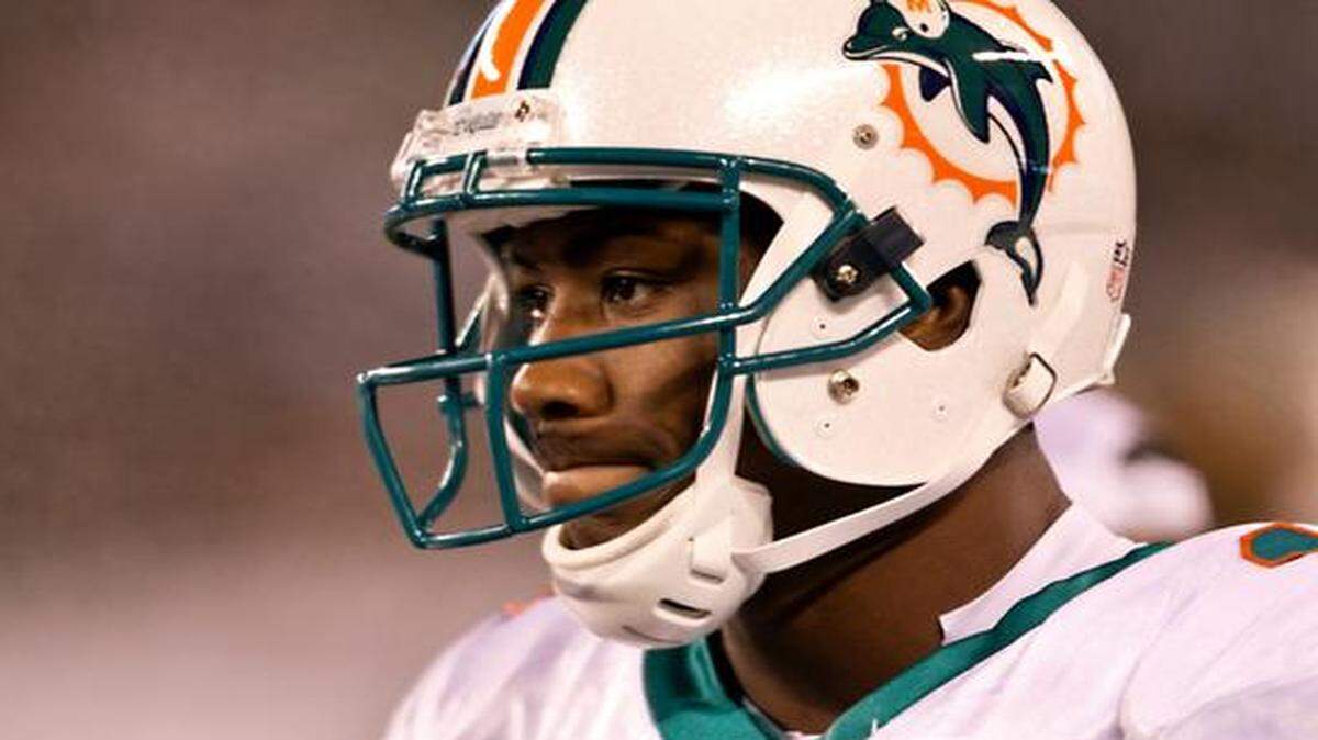 
FILE--Brandon Marshall frowns at the end of the game with the New York Jets at MetLife Stadium in East Rutherford New Jersey on October 17, 2001. Pro Bowl receiver Brandon Marshall, who had a long string of legal troubles, including domestic violence, was traded by coach Joe Philbin shortly after Philbin was hired in 2012.
