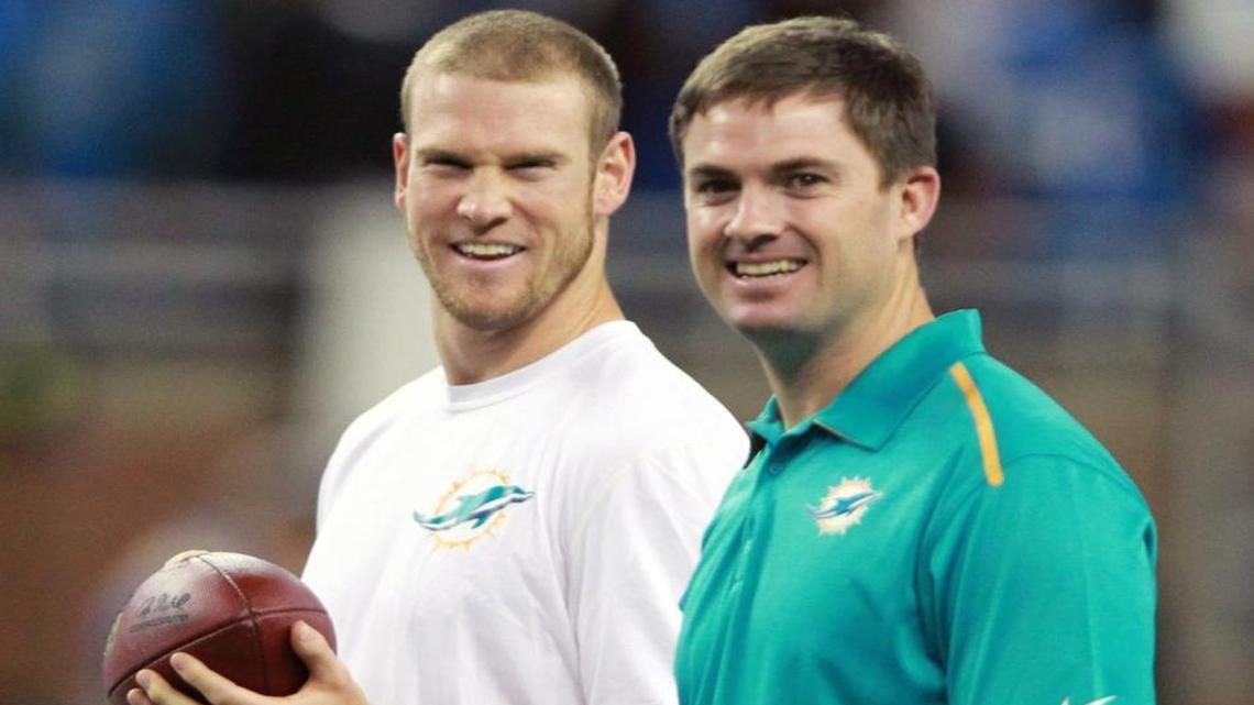 “I’m excited about the step we’re taking,” said Dolphins QB Ryan Tannehill, left, who will be allowed to audible now that Zac Taylor has taken over play-calling.