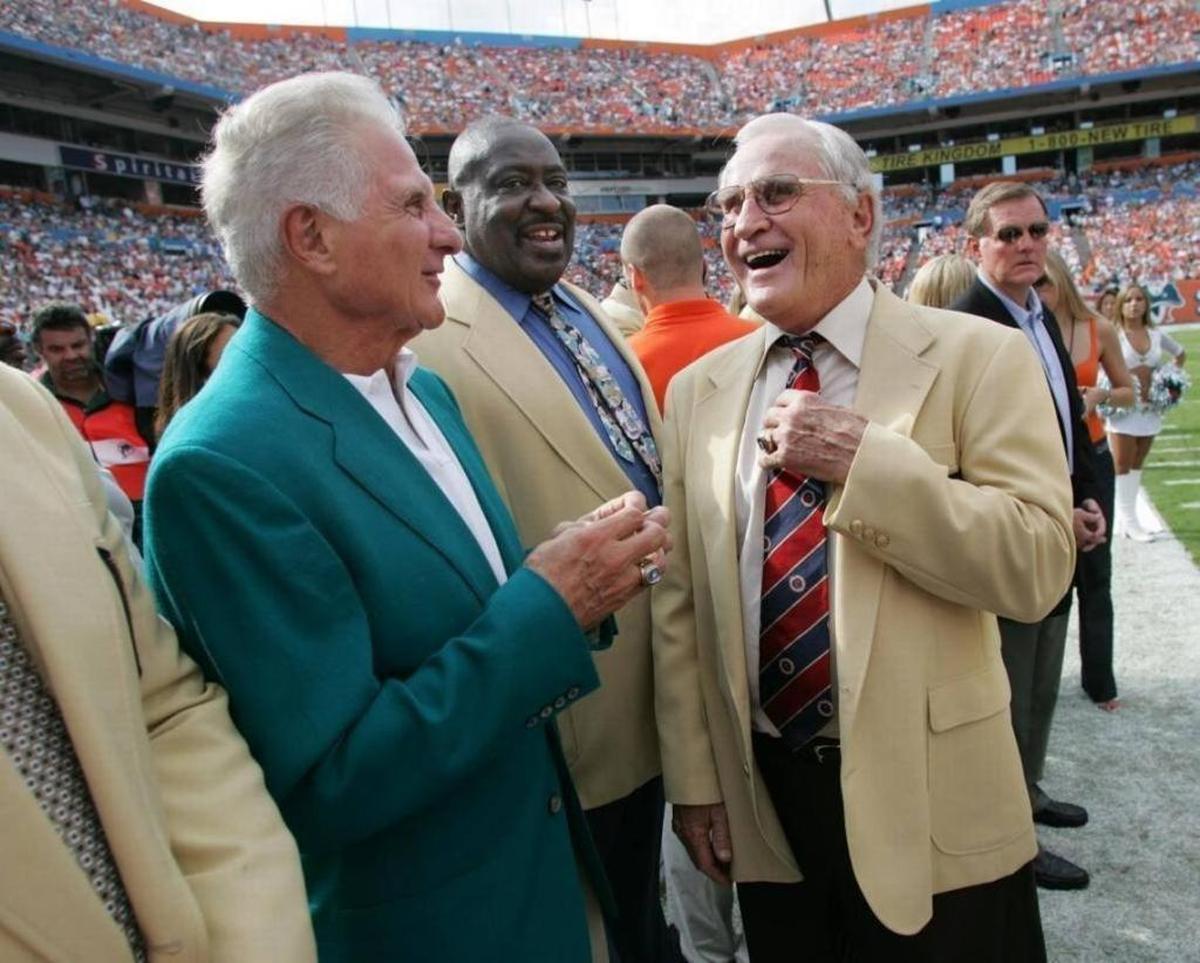 Dolphins great Nick Buoniconti (left) shares a laugh with another Hall of Famer, former coach Don Shula, at a Dolphins game. Buonconti passed away this week at 78 after a years-long battle with dementia.