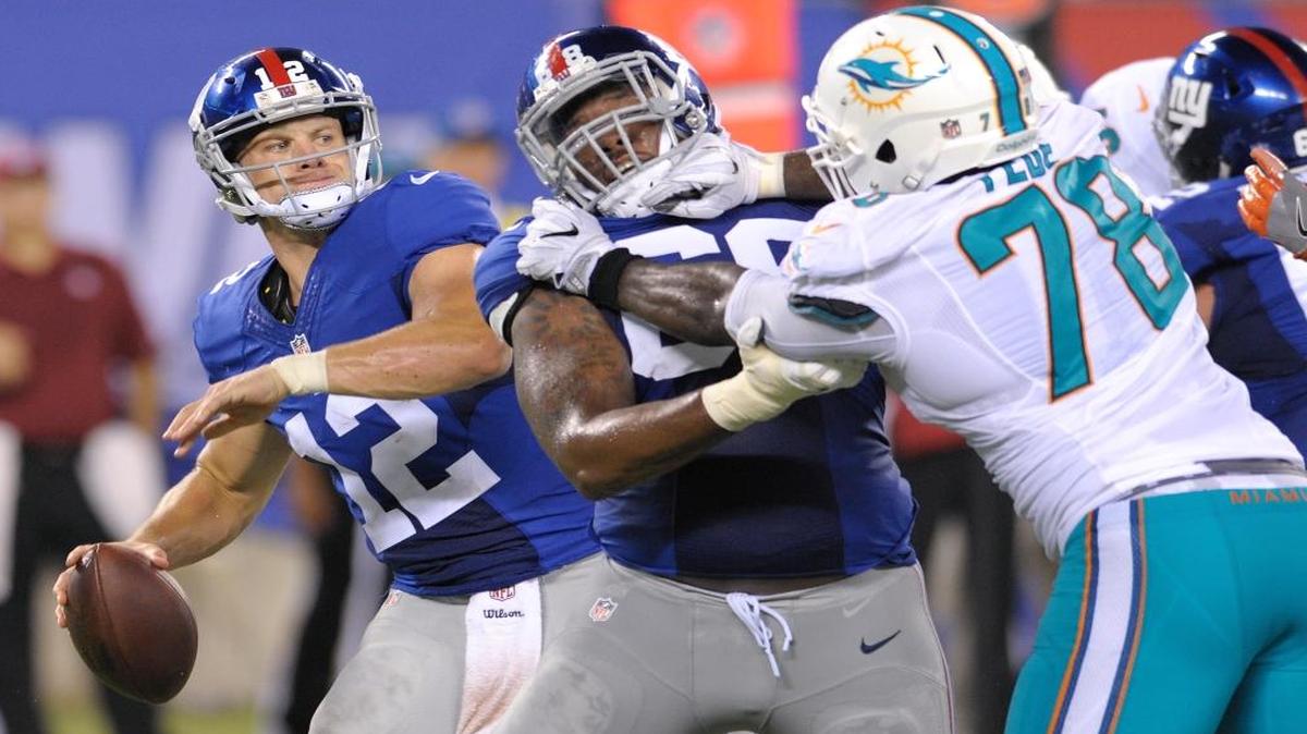 New York Giants quarterback Ryan Nassib (12) winds up to pass against the Miami Dolphins during the second quarter of a preseason NFL football game, Fri., Aug. 12, 2016, in East Rutherford, N.J.