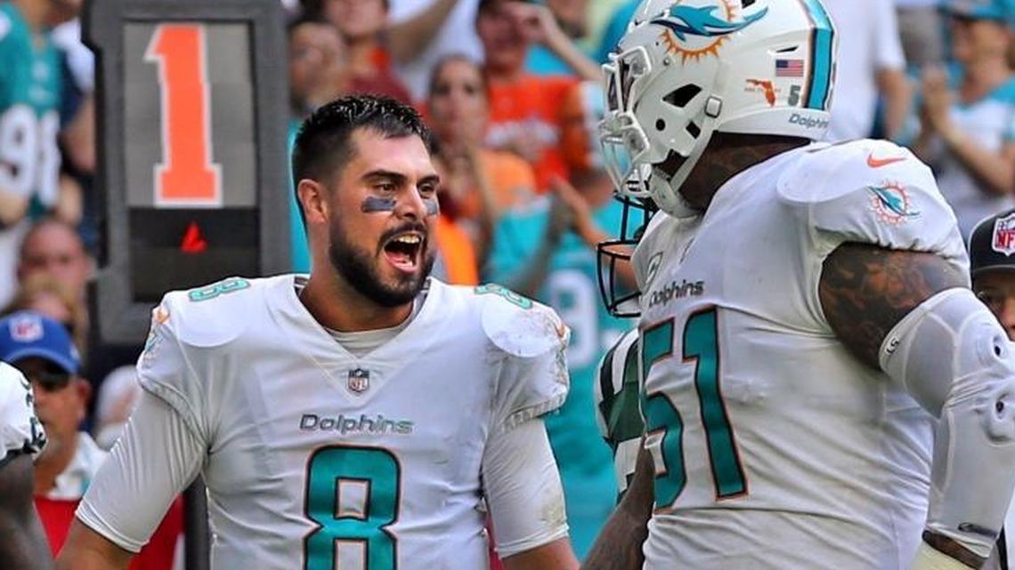 Miami Dolphins quarterback Matt Moore yells in the end zone after a touchdown was called back in the fourth quarter Sunday.