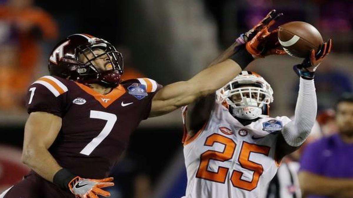 Clemson cornerback Cordrea Tankersley (25) catches a pass as Virginia Tech tight end Bucky Hodges (7) attempts to interfere, during the second half of the Atlantic Coast Conference championship NCAA college football game, Saturday, Dec. 3, 2016, in Orlando, Fla.
