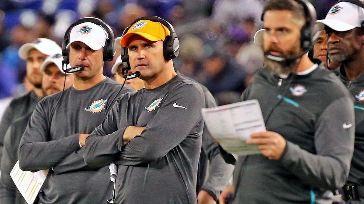 Miami Dolphins defensive coordinator Matt Burke, far right, took some blame. ‘I am always critical of myself … I always examine myself first. A couple calls that I wish I treated differently,’ he said.