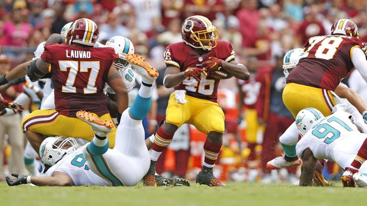 
Washington Redskins running back Alfred Morris (46) carries the ball in the first half. The Washington Redskins host the Miami Dolphins at FedExField in Landover, Maryland on Sunday, September 13, 2015.
