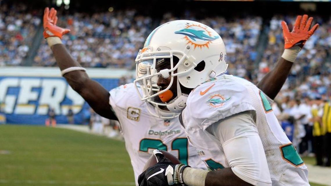Miami Dolphins cornerback Tony Lippett intercepts a pass in the end zone during the second half of an NFL football game against the San Diego Chargers in San Diego, Sunday, Nov. 13, 2016.