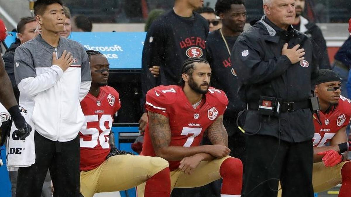 Colin Kaepernick, shown kneeling in No. 7, ‘has to be’ an option for the quarterback-needy Dolphins, Cris Collinsworth says.