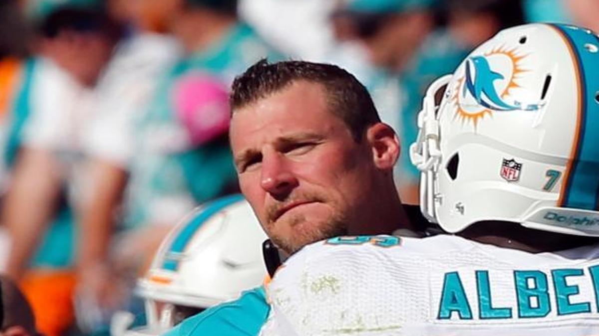 
Miami Dolphins left tackle Branden Albert gets a hug from interim head coach Dan Campbell near the end of the fourth quarter against the Tennessee Titans at Nissan Stadium in Nashville, Tenn., on Sunday, October 18, 2015.
