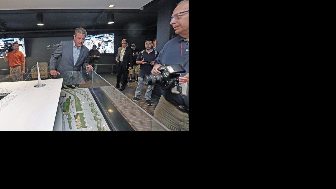 
Hall of Famer Dan Marino views the model of what Sun Life Stadium will look live after renovations on Tuesday, February 24, 2015.

