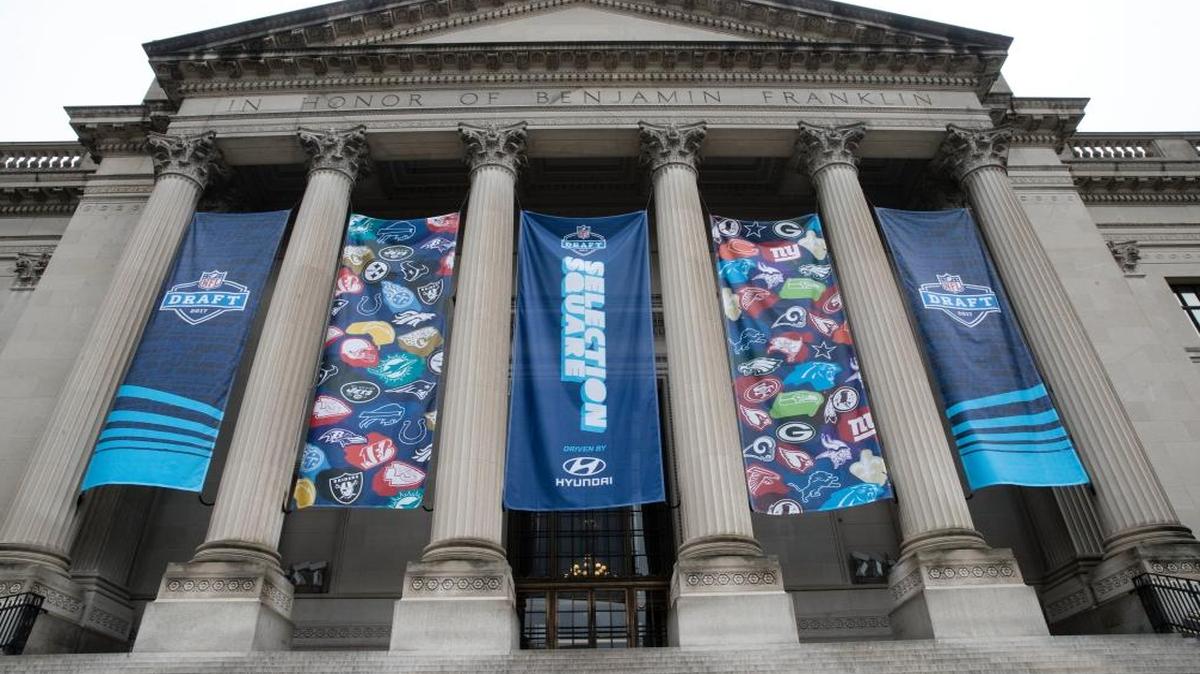 Banners hang from the Franklin Institute ahead of the 2017 NFL football draft, in Philadelphia, Wed., April 26, 2017.