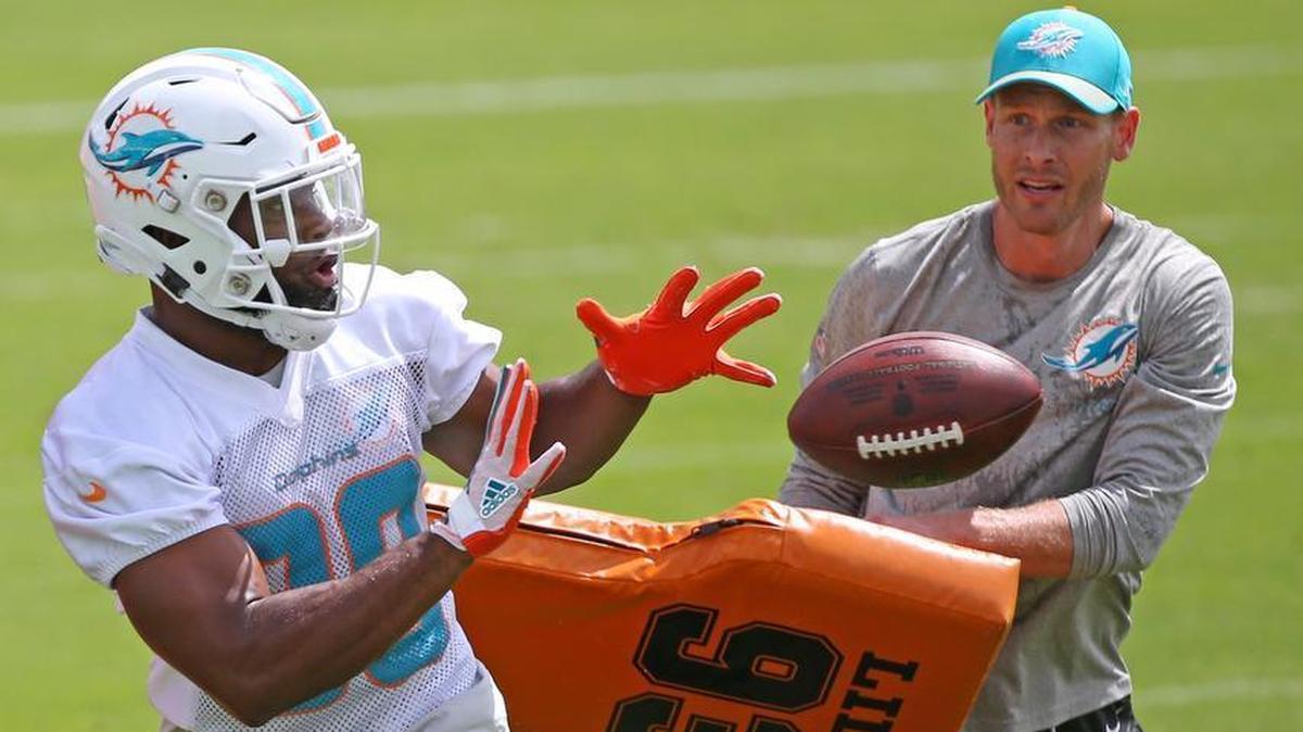 Wide receiver Leonte Carroo, seen here at an offseason practice, is among Dolphins fighting for a roster spot.