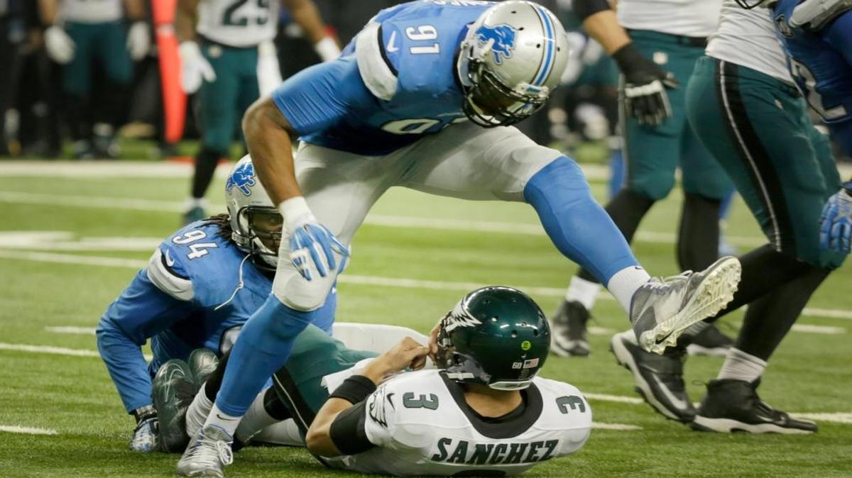 Detroit Lions' Jason Jones sacks Philadelphia Eagles quarterback Mark Sanchez during the second quarter on Thurs., Nov. 26, 2015, at Ford Field in Detroit.