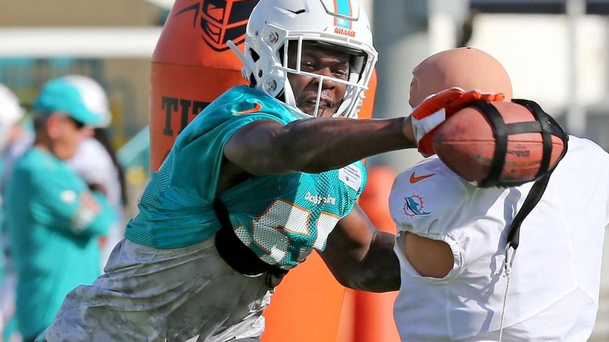 Miami Dolphins third-round rookie linebacker Jerome Baker, seen here practicing last Friday, has flashed at training camp but not enough to seriously challenge to be a starter yet.