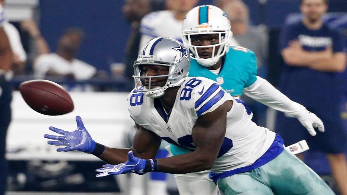 Dallas Cowboys wide receiver Dez Bryant (88) reaches out to catch a pass in front of Miami Dolphins defensive back Byron Maxwell in the first half of an NFL preseason football game, Fri., Aug. 19, 2016, in Arlington, Texas.