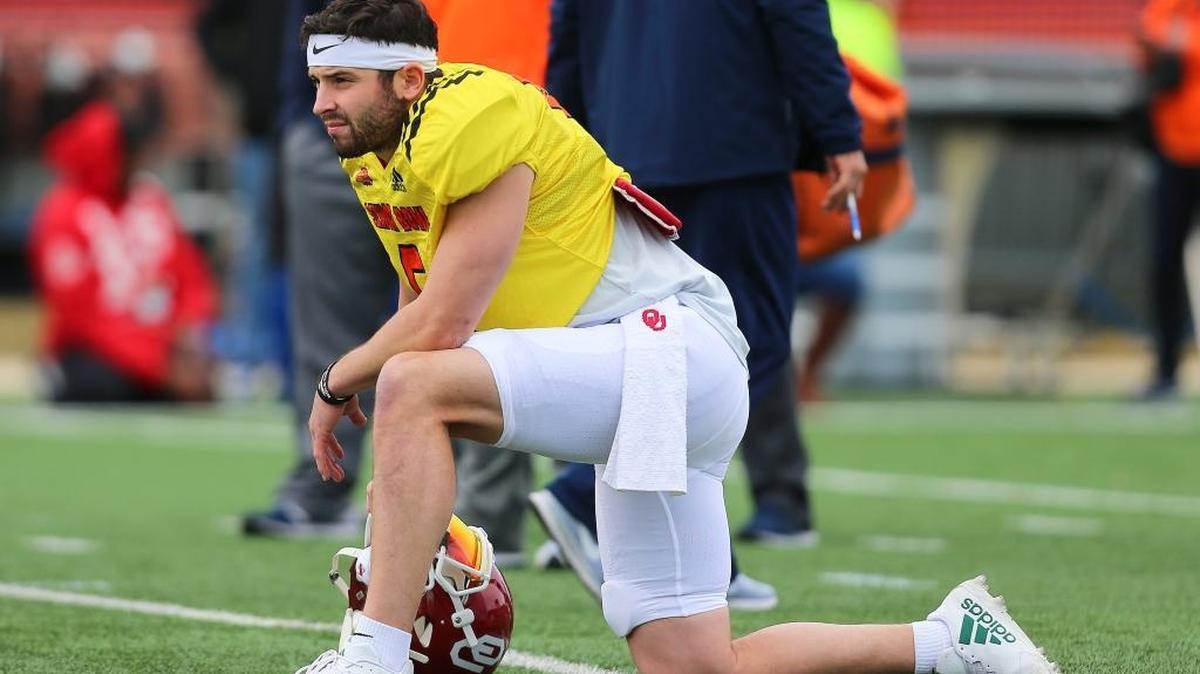 Oklahoma quarterback Baker Mayfield takes a knee during the North team’s Senior Bowl practice Wednesday.