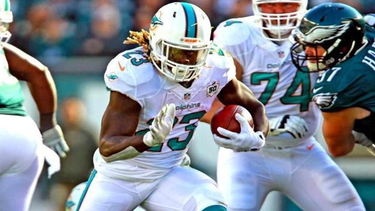 Miami Dolphins Jay Ajayi runs the ball against the host Philadelphia Eagles on Sunday, Nov. 15, 2015.