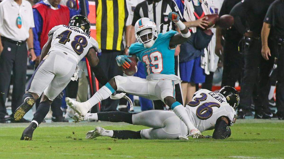 Miami Dolphins wide receiver Jakeem Grant (19) is tackled by Baltimore Ravens safety Chuck Clark (36) during an Aug. 25 preseason game. Grant has thrived since the Dolphins moved him from the slot to the boundary last year.
