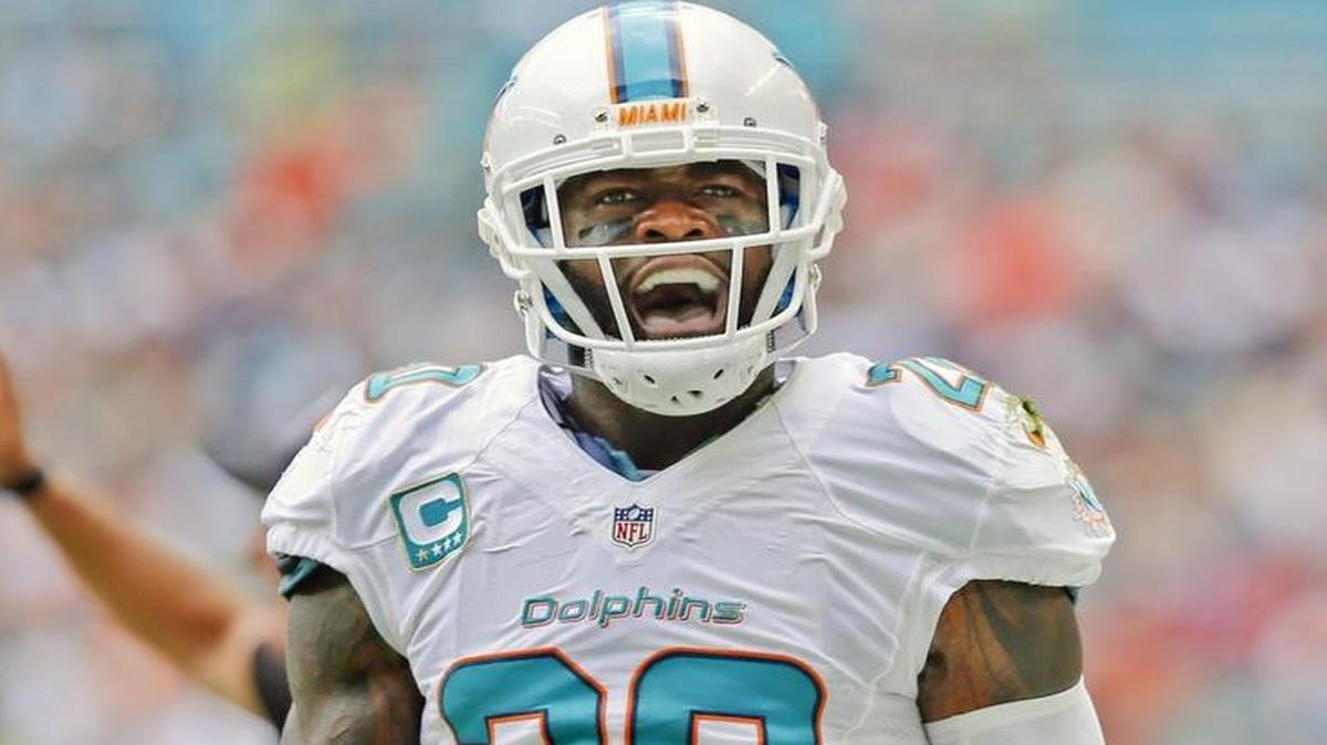 Miami Dolphins free safety Reshad Jones screams as the Miami Dolphins host the Cleveland Browns in the home opener at refurbished Hard Rock Stadium on Sun., Sept. 25, 2016.