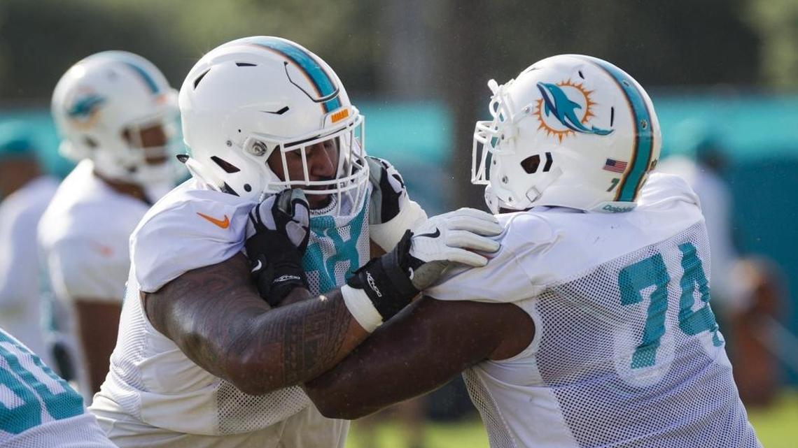Jermon Bushrod, right, gave full-throated support to his now former offensive line coach Wednesday.