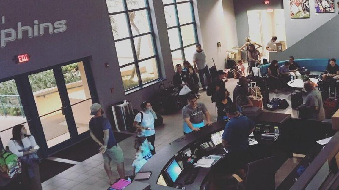 Miami Dolphins coaches, players, staff and families getting ready for the flight to Los Angeles Friday night.