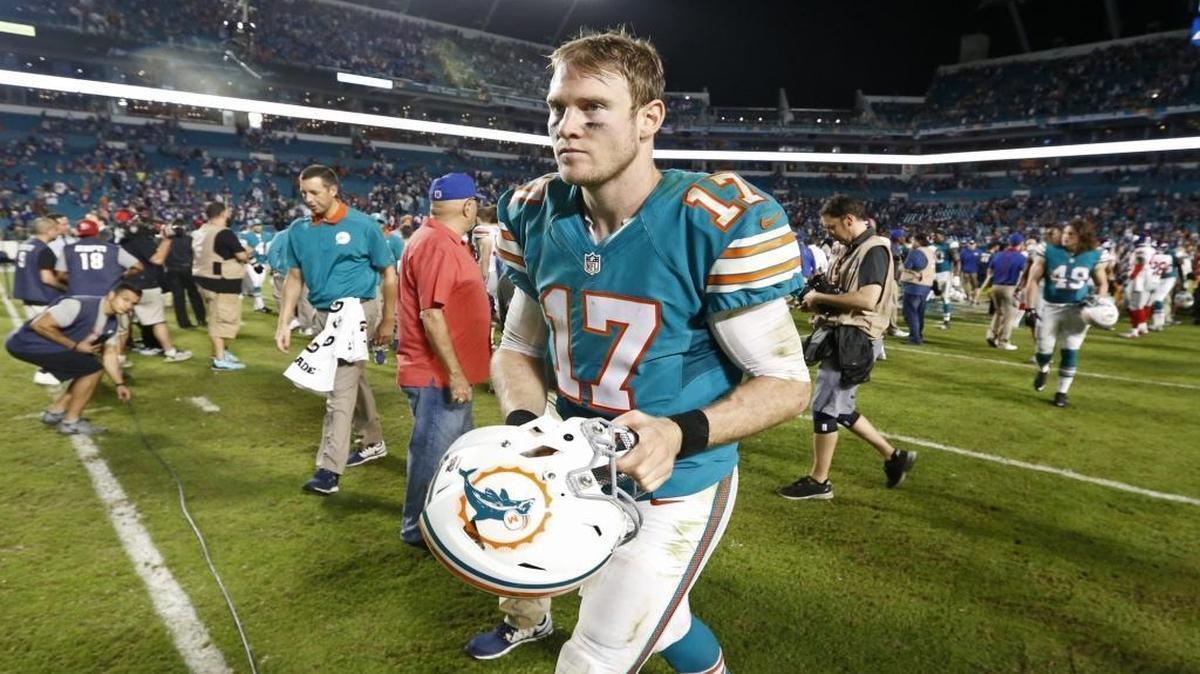 Miami Dolphins quarterback Ryan Tannehill walks off the field after losing to the New York Giants at Sun Life Stadium on Monday, December 14, 2015.