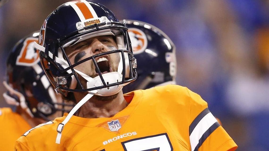 Denver Broncos quarterback Brock Osweiler (17) reacts to a touchdown against the Indianapolis Colts at Lucas Oil Stadium in Indianapolis on Thursday, Dec. 14, 2017.