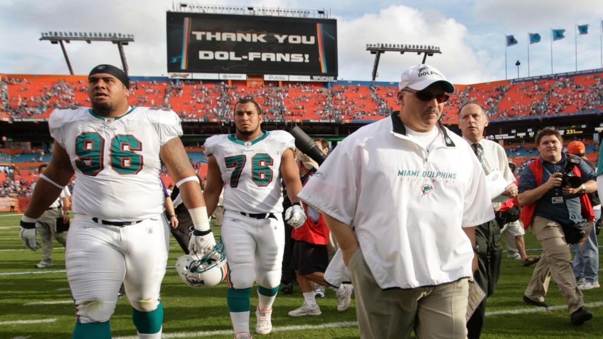 Miami coach Tony Sparano and the Dolphins leave the field at Dolphin Stadium after losing to Baltimore in the 2008 NFL playoffs.