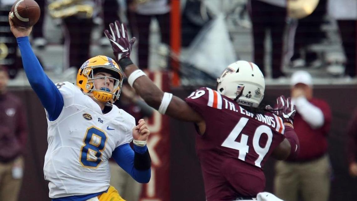 Virginia Tech linebacker Tremaine Edmunds rushes Pittsburgh quarterback Kenny Pickett during the 2017 season.