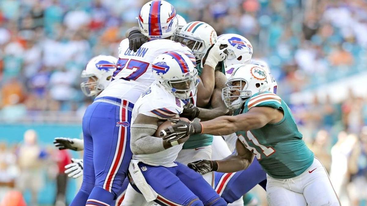 Buffalo Bills quarterback Tyrod Taylor (5) is sacked by Miami Dolphins defensive end Cameron Wake (91) in the fourth quarter as the Miami Dolphins host the Buffalo Bills at Hard Rock Stadium on Sunday, October 23, 2016.