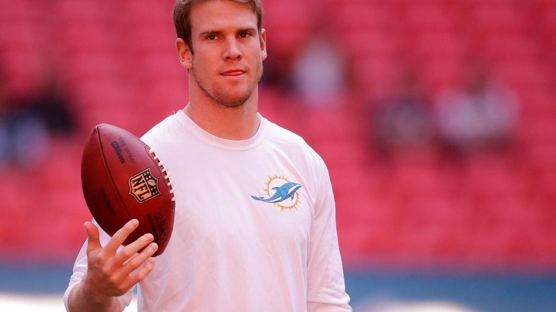 
Miami Dolphins quarterback Ryan Tannehill warms up before a game against the New York Jets at Wembley Stadium in London, Sunday, Oct. 4, 2015. 
