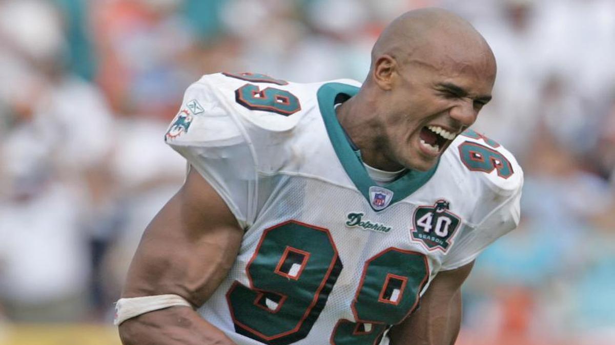 Dolphins defensive end Jason Taylor reacts after a play during a game against the Denver Broncos in 2005.