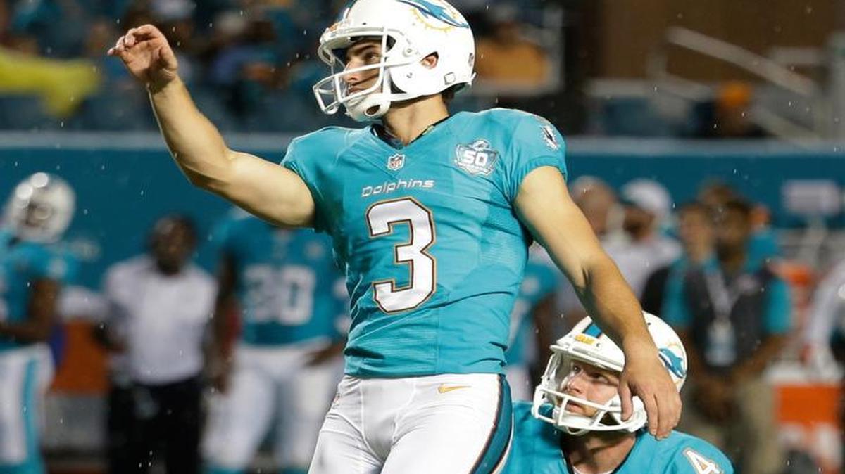 Miami Dolphins kicker Andrew Franks (3) watches his field-goal attempt during a preseason game against the Atlanta Falcons, Saturday, Aug. 29, 2015. Punter Matt Darr (4) is his holder.