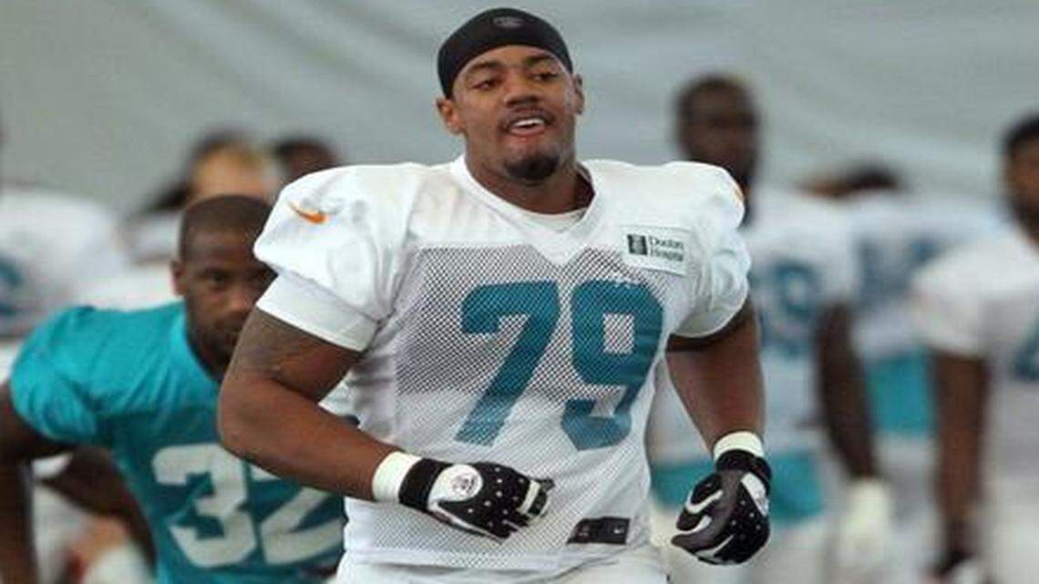 
Defensive end Derrick Shelby, shown here running practice drills on Sunday July 28, 2013. has been suspended indefinitely by the Dolphins as they try to sort out what happened in his bye-week altercation with police.
