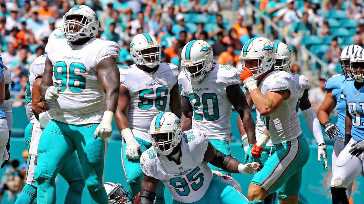 Miami Dolphins defensive tackle Vincent Taylor (96) yells after tackling Tennessee receiver Rishard Mathews (18) in a game last October. Taylor has played well during training camp.