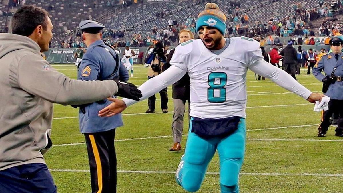 Miami Dolphins quarterback Matt Moore comes off the field after defeating the New York Jets at MetLife Stadium in East Rutherford, New Jersey, Dec. 17, 2016.