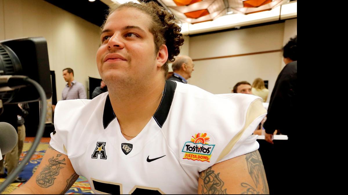 
Offensive lineman Chris Martin is shown while playing for Central Florida. 
