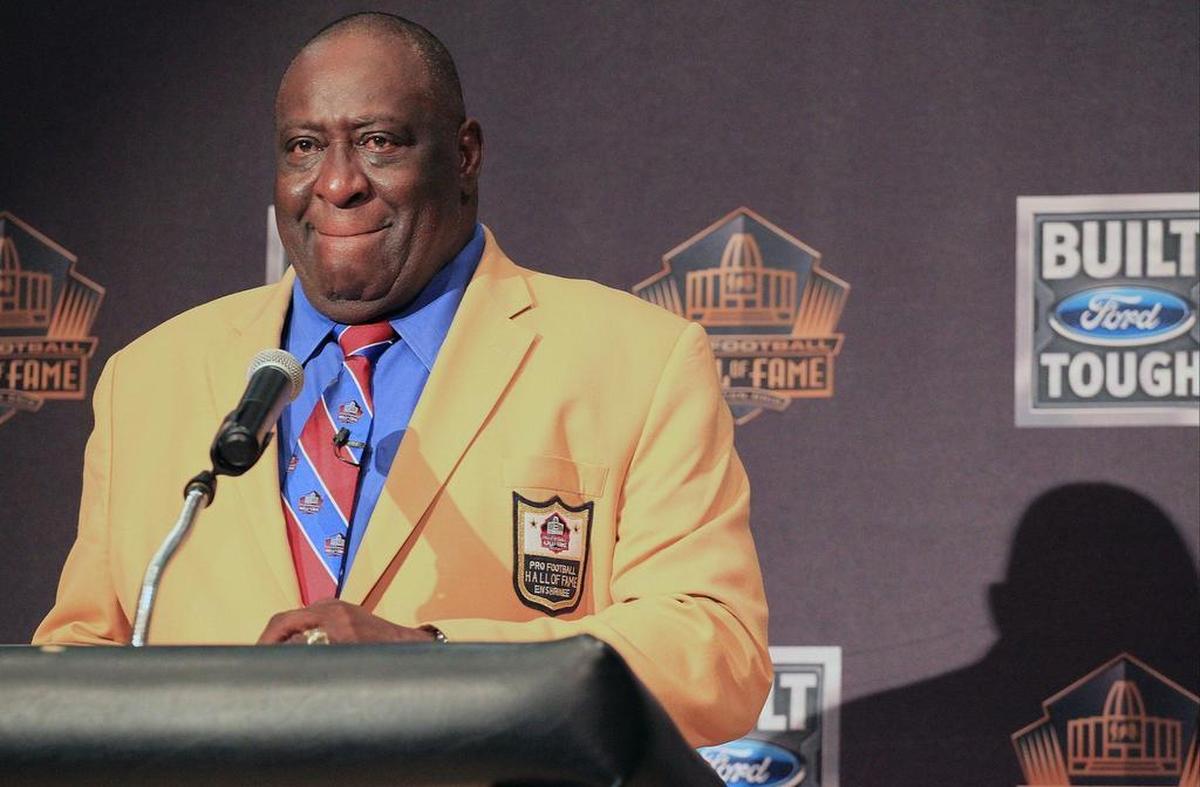 Larry Little bites down on his lips as he recalls the importance of believing in oneself and how he ended playing for the Miami Dolphins at unveiling of his plaque at Booker T. Washington High School. The Pro Football Hall of Fame and Ford Motor Company paid tribute to former Miami Dolphins Larry Little at his high school alma mater, Booker T. Washington High School on Wed., May 25th, 2016.