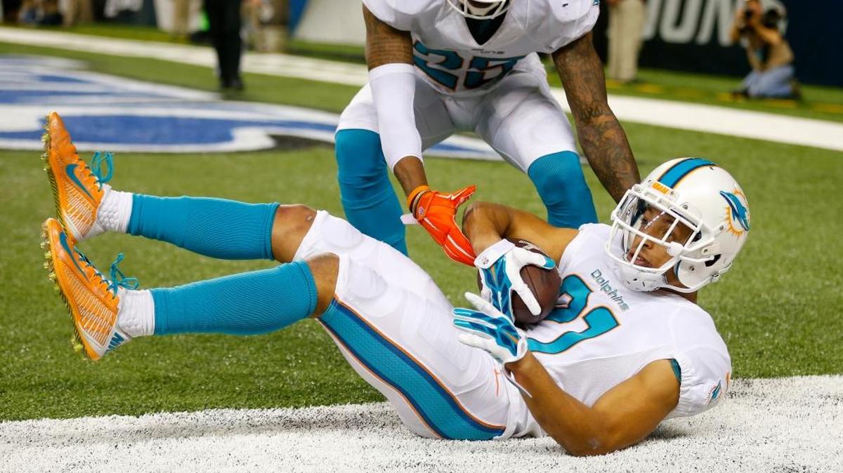
Brent Grimes had five interceptions in 2014, but couldn’t stop the Dolphins’ late-season swoon. Said Grimes, ‘We fought and fought and fought, but we just fell apart at the end of the year.’ 
