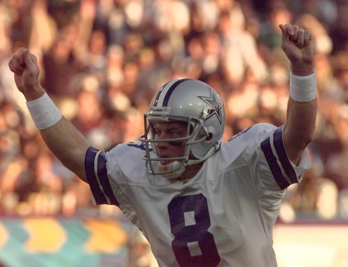 Dallas quarterback Troy Aikman celebrates a first quarter touchdown during Super Bowl XXX against the Pittsburgh.