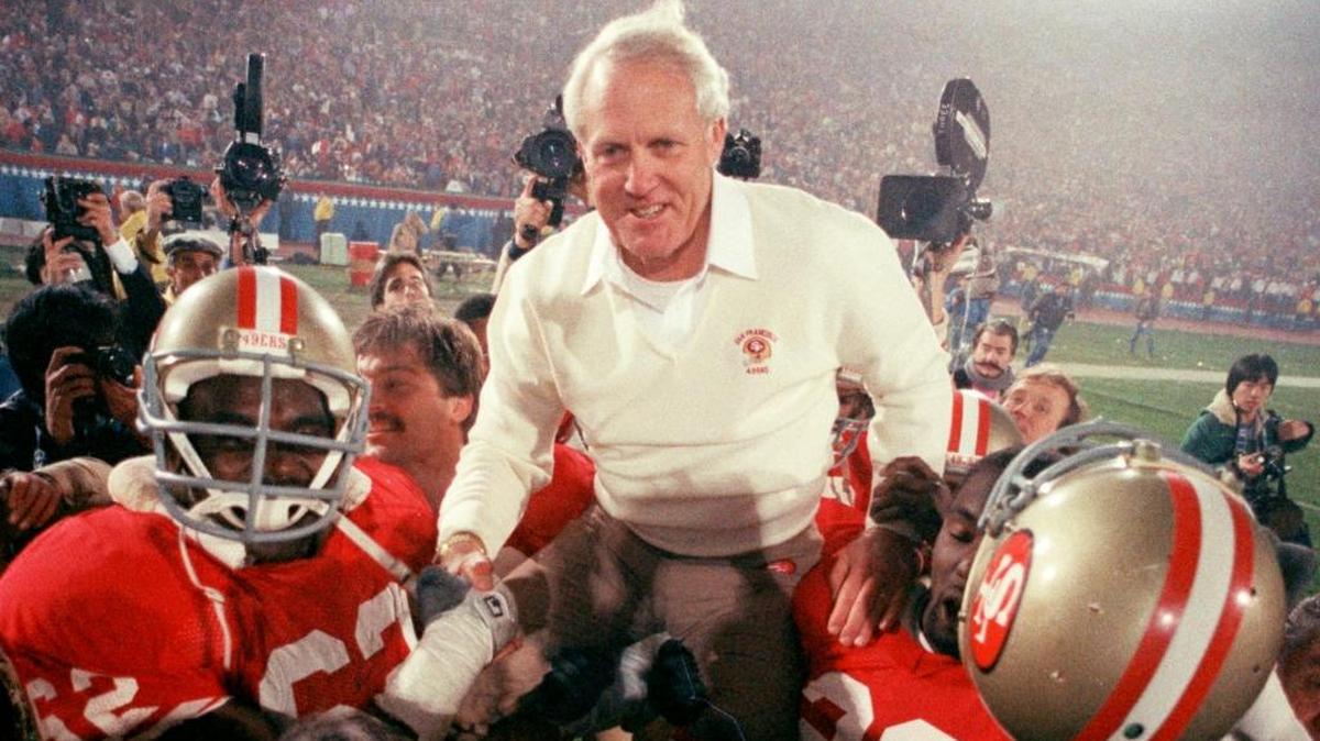 San Francisco 49ers coach (and former Stanford coach) Bill Walsh is hoisted on the shoulders of his team after they beat the Dolphins 38-16 in Super Bowl XIX on Jan. 20, 1985 at Stanford Stadium
