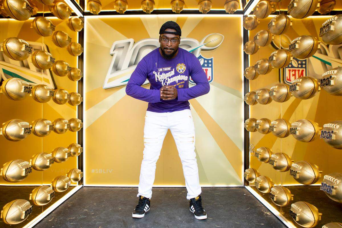 San Diego native Delvin Alexander, 26, poses inside of a Super Bowl LIV photo pop-up at Lummus Park in Miami Beach, Florida on Friday, January 31, 2020.