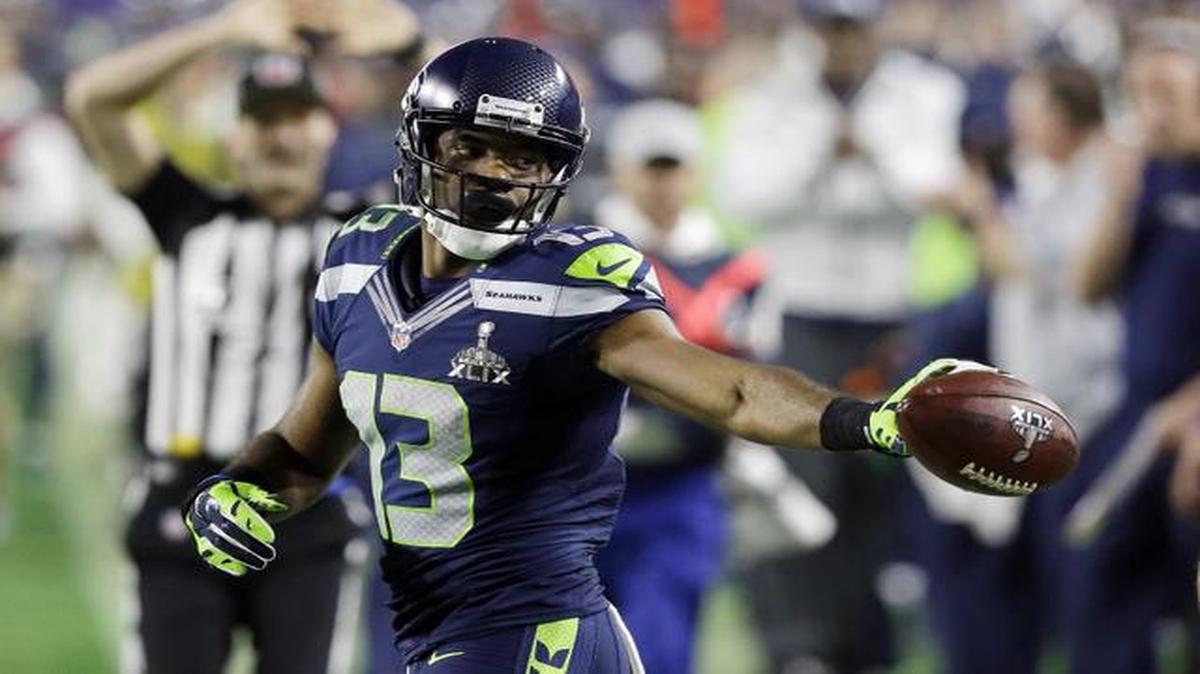 
Seattle Seahawks wide receiver Chris Matthews (13) tosses the ball to the ref after he made a catch against the New England Patriots during the second half of Super Bowl XLIX at University of Phoenix Stadium in Glendale, Ariz. on Feb. 1, 2015.

