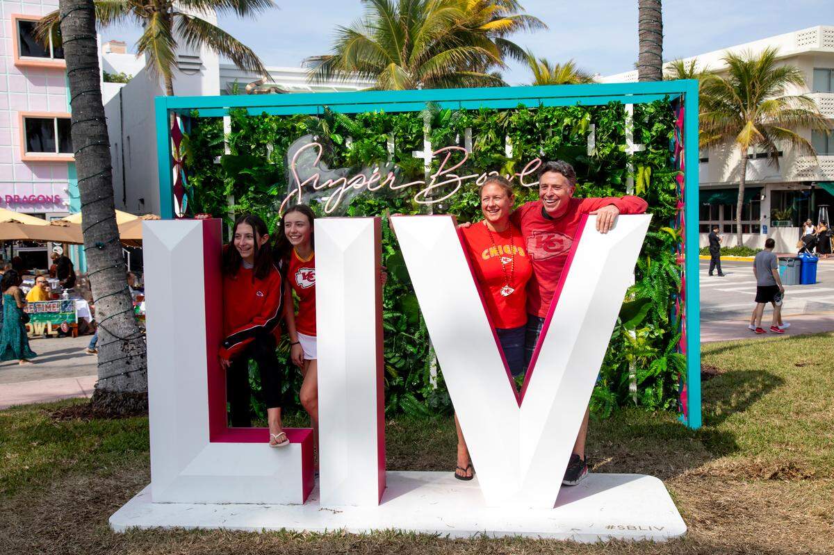 Kansas City natives, from left, Eden, Aniston, Cindy, and Tom Wintz pose for a photo in front of a Super Bowl LIV photo pop-up at Lummus Park prior to Super Bowl weekend in Miami Beach, Florida, on Friday, January 31, 2020.