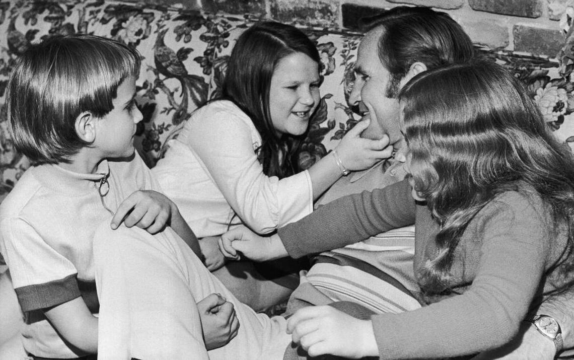 Miami Dolphins Coach Don Shula plays with three of his children at his Miami Lakes home on Jan. 5, 1972. From left are: Michael, Sharon and Anne. Shula was named by the Associated Press on Friday as the National Football Coach of the Year.